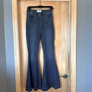 We The Free, high waisted flare button front jeans, size 28, medium wash